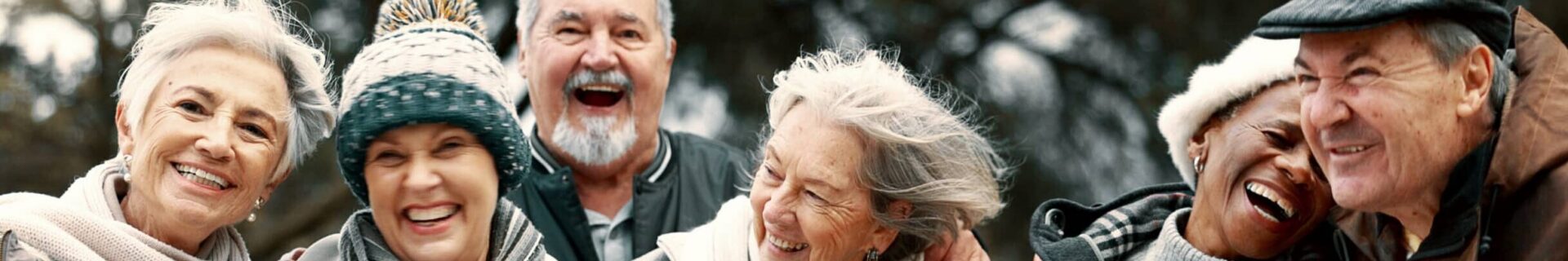 Happy, portrait and senior friends in a park while walking outdoor for fresh air together.